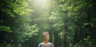 A serene woman practices yoga in nature amidst soft greens and earthy tones.